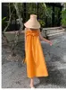 Casual klänningar sommar orange lös ruffle kant ärmlös klänning strand backless spaghetti rem kvinnor söta eleganta damer fasta