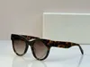 Okrągłe okulary przeciwsłoneczne czarne szary soczewki gradientowe kobiety moda letnie sunnies Sonnenbrille UV Ochrona okularów z pudełkiem