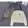 Miumius Designer Knitwear Luxe mode voor dames breien T -stukken Autumn/Winter Wear Fashionable Parreny gebreide vesttrui trui jas dames kort