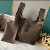 10A Sacs de créateurs Atlantis Sac à panier d'épicerie 2023 Édition de piste Nouvelle édition limitée Sacs à main pour femmes Style classique M46816 Sac à bandoulière en cuir de vachette M46817 Marron