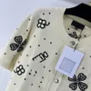 2024 Nya vårtoppar Milan Runway Sweaters O Neck Short Sleeve High End Jacquard Cardigan Women's Designer Clothing 0225-17