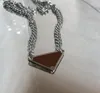 Designer Argent Couleur Mens Collier Femmes Triangle Lettres Tendance Punk Émail Cool Street Femmes Pendentifs Colliers Dames Chaînes Bijoux De Luxe