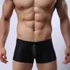 Sous-vêtements Sexy Gay Sous-vêtements Hommes Boxers Shorts Mesh Faux Cuir Culotte Homme Taille Basse U Poche Convexe Cueca Masculina Noir S-L