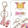 Nyckelringar 26 Inledande A-Z Dreamy Sequin Letters Keychain för kvinnor Tassel Butterfly Pendant Keyring Suspension Påsar Charms Bil Key Chain