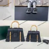 Borsa di design borse da donna 90% di fabbrica Vendite calde all'ingrosso di top in pelle di top in pelle denti per cani Saigon manico in legno manico a legna con una spalla Crossbody Borse