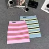 MIUMIUS Diseñador Knitwear Fashion Fashion For Women Knits Tees Tell Spring Striped Striped Wood Falda de mosaico Conjunto de falda de cintura con cintura corta