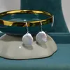 Orecchini pendenti in argento sterling con gancio per l'orecchio, stile naturale all'ingrosso, perla d'acqua dolce dei mari del sud da 11-12 mm