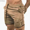 Herr shorts män som kör sport randig basket shorts echt ny gym fitness träning bermudas dold bälte kort man mesh korta byxor homme 240226