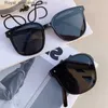 Sunglasses Luxury and fashionable folding sunglasses for womens brand designer retro cat eye sunglasses for mens glasses UV400 Q240226