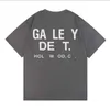 Designer Designer Tee Depts T-shirts Casual Man Womens Tees peints à la main éclaboussures d'encre graffiti lettres lâches manches courtes col rond vêtements taille asiatique s5xl designerK