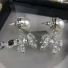 Designer miuimiui Miao Familie Neue Ohrringe Mode Süße Temperament Kristall Ohrringe Super Fee Ins Stil Bogen Perle Ohrringe Weibliche