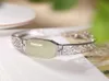 S925 Sterling Silber eingelegte Hetian Jade weiße Jade ausgehöhltes Muster Persönlichkeit Temperament Dame Armband für Frauen Schmuck6914744