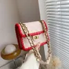 Xiaoxiangfeng Lingge Chain Femmes 2023 Nouvelle couleur contrastée tissage petit carré et à la mode une épaule sac à bandoulière 75% vente en gros d'usine