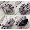 Midjesäckar lyxiga design kvinnor läder handväskor och handväska mode crossbody för graffiti axelväska