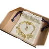 Anhänger Halsketten Armband und Halskette Sets für Frau Designer Gold Schlüssel Alte Blumenketten Anhänger Damenschmuck Luxus V Armband Dhywu