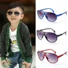 Lunettes de soleil Frames Fashion Kids Lunettes de soleil Lunes colorées FaMes Girls Garçons Lunes pour enfants UV400 Baby Mirror Sungass