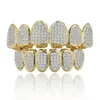 Biżuteria hip -hopowa męska diamentowe zęby zęby Osobowość uroków złoto lodowane grille mgła modna akcesoria 33136272946