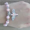 Strand moda estiramento pulseira anjo cruz pingente rosário contas jóias religiosas lembrança de viagem presente para menina