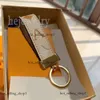 Bieciki LVSE Smyczowe ręcznie robione projektant Dragonne Multicolor Key Chain Men Men Mężczyzn Brązowa skórzana torba portfel Smycz Smarda Złote Akcesoria Klasyna 998