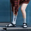 Damensocken Herbst Winter Damen Tube Sportstil Europäischer und amerikanischer Trend Straße Persönlichkeit Mode Blitzdruck