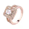 Con pietre laterali che vendono anello in oro rosa per le donne Gioielli di moda in nichel Anelli nuziali da sposa Regalo per la festa delle donne F337y