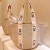 Straw the Tote Raffias Woody Korb Designertasche 7A Luxurys Handtasche Damen Häkelgewebe Strand Shop Umhängetaschen Herren Sommer Eimer Clutch Umhängetasche Reisehandtasche