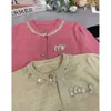 MIUMIUS Diseñador Knitwear Fashion para mujeres Knits Outumn Redonde Round Color sólido Cardigan Fresh Sweet Collar Heavy Handmaded Boaded Boaded