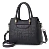 2023 Retro Alligator Women Luxury Pu Leather Handväskor Kvinnliga Tassel Designer axel Messenger väskor Casual Ladies Tote Bolsas