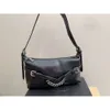 Sac fourre-tout SS23 Sac à bandoulière de tendance de mode pour femmes Small Punk personnalisé Motorcycle Pradie Sac à main levée Bag de chaîne à main