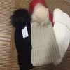 2022 Adultes épais chapeau d'hiver chaud pour femmes câble extensible doux tricoté pompons bonnets chapeaux femmes Skullies bonnets fille casquette de ski 223a