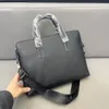 2024 Handstickad Brand Designer BROFTCASES Nya ankomst Högkvalitativa affärsväskor för män äkta läderföretag Laptop Handbags23