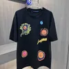 夏の男性デザイナーTシャツコットンルースカジュアルティーレタープリント半袖シャツファッションヒップホップルーズフィット大サイズ太陽プリント半袖Tシャツトップ