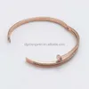 2023 Gioielli di moda in acciaio inossidabile 316L Bracciale per unghie placcato oro rosa Micro pavimenta cristalli Bracciale rigido