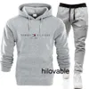 Inga logotyp Fashions Hilovable Spring New Sweater Hoodie Set för män Löst och plyschad solid färg för kvinnor