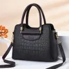 2023 Retro Alligator Women Luxury Pu Leather Handväskor Kvinnliga Tassel Designer axel Messenger väskor Casual Ladies Tote Bolsas