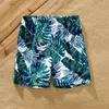 Familjsmatchande kläder PA Familj Matchande badkläder Allover Palm Leaf Print Crisscross One-Piece Swimsuit and Swim Trunks Swimsuit