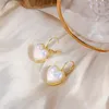 Boucles d'oreilles à clous en forme de sirène, perle d'amour, blanc laiteux, élégante, douce, pour fille, Micro ombre réfléchissante, bijoux à la mode, cadeau, 2024