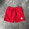 Diseñador Diseñador Pantalones cortos para hombre Moda de verano Pantalones de playa Hombres Ropa de calle de alta calidad Rojo Azul Negro Pantalones morados Pantalones cortos sueltos para hombre diseñadorFGIA