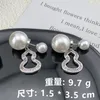 Franse lichte luxe super flitspompoen voor en na de grootte van imitatiepareloorbellen een paar temperamentoorbellen eenvoudige oorbellen