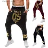 Herrbyxor Nya 2021 Spring Autumn Casual Low Crotch Hip Hop Beam Foot Leg Pants Streetwear Street Dance Gold Number Printed Trousers Men T240227