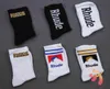 Lettre simple Coton de haute qualité Tendance de la rue européenne américaine Hommes et femmes Rhude Couple In-Tube Chaussettes 2022 Elite Branded4894969