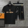 Herrespår t -shirt set lyxiga designers bokstav tryck mode sportkläder kostym män kläder sommar löpning slitage skjorta korta ärmsport två stycken kostym