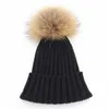 Boinas GZHILOVINGL Big Pompoms Gorro de punto Sombrero para mujeres Hombres Invierno Natural Mapache Piel Sombreros Cálidos Fábrica de China