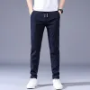 Pantaloni pantaloni casual da uomo inverno spessa elasticità morbida elasticità in vita solido tasca applique corea grigia grigio lavoro lavoro maschio 38