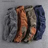 Chemises décontractées pour hommes Printemps et automne nouveau américain rétro velours côtelé couleur unie chemise cargo hommes pur coton à manches longues poche blouses décontractées manteau T240227