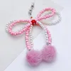 Porte-clés doux nœud papillon en peluche boule pendentif à breloque chaîne sangles de téléphone poche porte-clés sangle suspendue décoration pour clés sac sac à main