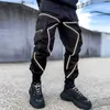 Herenbroeken Heren Gym Joggers Casual broek Joggingbroek Fitnessbroek Hiphop Cargobroek Mannelijke streetwear Mannen Reflecteren Sport-trackbroek T240227