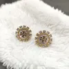 الأزياء الفرنسية Zircon Zircon Sunflower أقراط للسيدات الفاخرة الفاخرة الراقية البساطة عبر الإنترنت المجوهرات الساحرة الحمراء