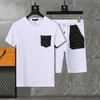 Herrespår t -shirt set lyxiga designers bokstav tryck mode sportkläder kostym män kläder sommar löpning slitage skjorta korta ärmsport två stycken kostym