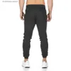 Pantalons pour hommes Noir Joggers pantalons de survêtement hommes pantalons décontractés mince couleur unie gymnase entraînement vêtements de sport en coton automne mâle Fitness Crossfit survêtement T240227